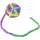 Colorful fuzzy ball toy with long tail, made of intertwined soft fabric strips, for pets.