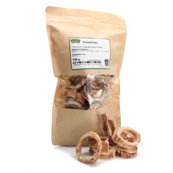 Getrocknete Haustier-Leckereien in einer transparenten Tüte mit braunem Papieraußen, beschriftet mit "Knorpelringe" und wiegend 150g.