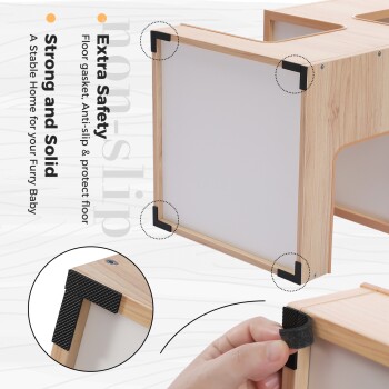 Bild eines Haustiermöbelstücks mit einem Holzrahmen und rutschfesten Ecken, beschriftet mit "Extra Sicherheit" und "Stark und Stabil."