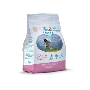 Swiss Natural Adult Mini Hundefutter 1 kg, 72% Lamm, weiß/rosa Tüte mit Bergfoto und Text 'Smell it. Taste it. Love it.'.