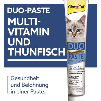GimCat Duo-Paste Tube mit Katzenmotiv, beschriftet 'DUO-PASTE MULTI-VITAMIN UND THUNFISCH' und Slogan 'Gesundheit und Belohnung.'