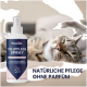 Eine Flasche Pawlie's Fellpflege Spray mit dem Etikett "100% natürliche Inhaltsstoffe" steht neben einer schlafenden Katze. Text: "NATÜRLICHE PFLEGE OHNE PARFÜM."