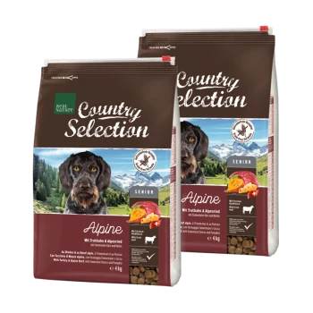 Zwei Beutel Real Nature Country Selection Hundefutter, mit der Aufschrift 'Alpine', für ältere Hunde, mit Truthahn und Alpenkräutern, jeweils 4 kg.
