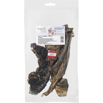 Getrocknete Wildschweinhalswirbel-Hundeleckerlis in einer klaren Verpackung, beschriftet mit "Wild & fein," die 100% natürliche Zutaten aus Österreich zeigt.