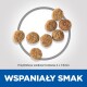 Karma dla zwierząt w postaci granulek ułożona w okrąg z polskim tekstem "WSPANIAŁY SMAK" i rozmiarem "4 x 7,5 mm."