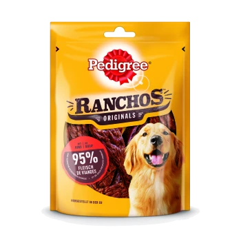 Eine leuchtend gelbe Verpackung von Pedigree Ranchos Originals Hundeleckerlis mit einem lächelnden Golden Retriever und einem Etikett mit der Aufschrift '95% Fleisch de Viandes.'