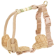 Beige padded dog harness with adjustable straps, plastic buckles, and metal D-rings, designed for comfort and control.