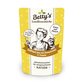 Die Verpackung von Betty's Landhausküche Katzenfutter zeigt einen Koch und eine Katze, mit Text über Geflügel, Borretschöl, Taurin und Katzenfutter für Erwachsene.