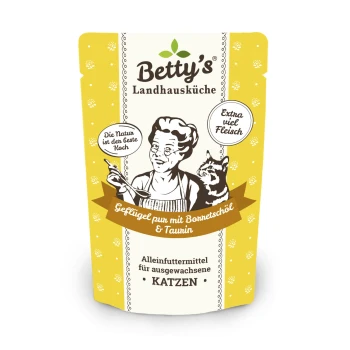 Die Verpackung von Betty's Landhausküche Katzenfutter zeigt einen Koch und eine Katze, mit Text über Geflügel, Borretschöl, Taurin und Katzenfutter für Erwachsene.