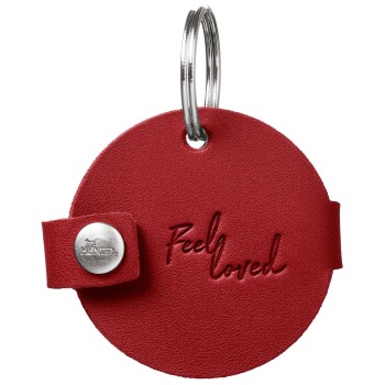 Roter Leder-Haustieranhänger mit einem silbernen Druckknopf und Schlüsselring, geprägt mit dem Satz "Feel loved."
