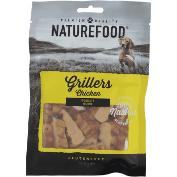 Naturefood Grillers Chicken Tierleckerlis Verpackung, mit einem gelben Etikett, das "100% Natürlich" und "Glutenfrei" angibt, mit einer malerischen Hintergrund.