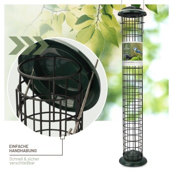 Grüner Vogelfutterspender mit einem schwarzen Drahtkäfig, beschriftet mit "NIESENKÖDELHALTER" und "EINFACHE HANDHABUNG - Schnell & sicher verschließbar."