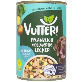 Eine Dose Vutter! Hundefutter mit einem braunen Hund auf dem Etikett, das besagt "Pflanzlich Vollwertig Lecker" und zeigt Kartoffeln und Spinat.