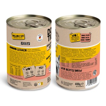 Verpackung für Dosen-Hundefutter mit "DOG TIGER" Branding, mit Etiketten, die "100% rein, 100% echt, 100% Futter" und Nährwertinformationen angeben.