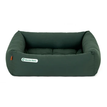 Grünes Haustierbett mit gepolstertem Design, mit dem Logo "Doctor Bark" an der Seite.