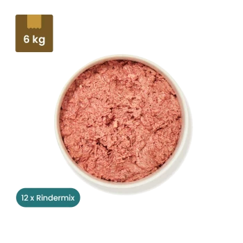 Verpackung von gefrorenem Haustierfutter mit der Aufschrift 'Rindermix' (500g) für Hunde und Katzen, zeigt Nährwertangaben und eine Schüssel mit rohem Fleischmix.