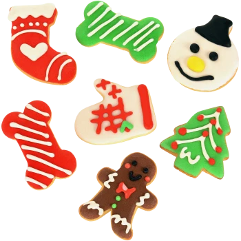 Verschiedene weihnachtlich gestaltete Hundeleckerlis in Form von Strumpf, Knochen, Handschuh, Schneemann, Weihnachtsbaum und Lebkuchenmann.