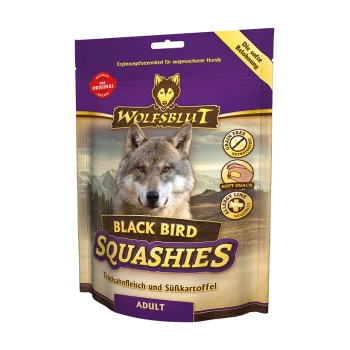 Verpackung von Wolfsblut Black Bird Squashies Hundesnacks, mit einem Wolf-Logo, das behauptet, getreidefrei und ein weicher Snack für erwachsene Hunde zu sein.