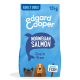Dog food bag featuring "Edgard Cooper" brand, labeled "Norwegian Salmon," 12kg, grain-free, with illustrations of a dog and fish.