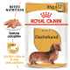 Emballage de nourriture pour chiens adultes Royal Canin Dachshund, présentant une illustration de teckel, avec un texte mettant en avant la nutrition de la race et le soutien des articulations.
