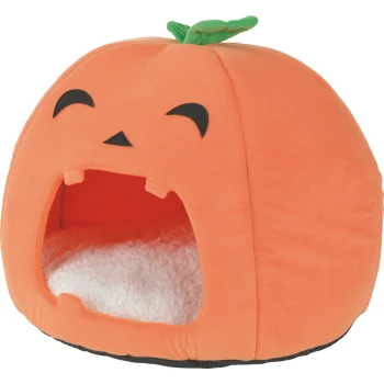 Plüsch-Kürbis-Haustierbett mit Jack‑o'‑Lantern-Gesicht, grünem Blattstängel, offenem Mund-Eingang und weißem Sherpa-Kissen.