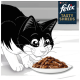 Un chat noir et blanc de dessin animé s'approche avec empressement d'une assiette de nourriture pour chat Felix Tasty Shreds, avec le logo du produit visible dans le coin.