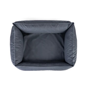 Draufsicht auf ein rechteckiges dunkelgraues gepolstertes Haustierbett mit erhöhten Seiten und weißer Paspel.