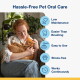 Woman holding orange cat on couch beside text "Hassle-Free Pet Oral Care" and a list of benefits with blue icons.