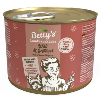 Wild & Geflügel 6x200 g Dosen-Hundefutter, beschriftet mit "Betty's Landhausküche Wild & Geflügel mit Preiselbeeren," mit einer Frau, die einen Löffel hält, und einer Hundillustration.