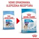 Dwie torby karmy dla psów Royal Canin oznaczone 'JUNIOR GIANT' i 'JUNIOR 8-18/24 miesiące', z czerwoną strzałką wskazującą na nową formułę i opakowanie.