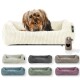 Ein cremefarbener, gerippter Hundebett mit einem Herzanhänger, umgeben von sechs bunten Betten in Grau, Teal, Grün, Mauve und Beige.