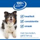 Blije driekleurige hond met Nederlandse tekst die 100% tevredenheid, kwaliteit, consistentie en smaak garandeert, geld-terug-aanbieding.