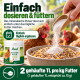 Zwei braune Hühner stehen in einem grasbewachsenen Bereich, mit dem Text 'NATÜRLICHE HALTUNG für glückliche Hühner' deutlich am unteren Rand angezeigt.