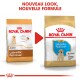 Deux sacs de nourriture pour chiens Royal Canin étiquetés 'Junior' et 'Puppy Labrador Retriever', avec un superposition 'NOUVEAU LOOK, NOUVELLE FORMULE'.