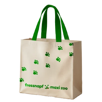Beige canvas tote with green handles, scattered green paw prints and 'fressnapf maxi zoo' logo.