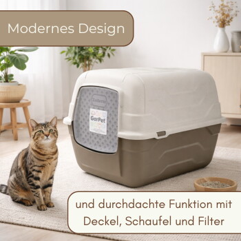Getigerte Katze neben beige-brauner, abgedeckter Katzentoilette; Klappe beschriftet mit 'Toilette'/'GarPet'; Banner: 'Modernes Design.'