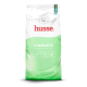 Husse Complete Katzenfutterbeutel, weiße und grüne Verpackung mit rotem Husse-Logo, Aufdruck 'COMPLETE' und Slogan 'Premium ausgewogene Ernährung'