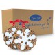 Ein schneeflockenförmiger Vogelfutterornament umgeben von Sonnenblumenkernen, gekennzeichnet mit "dekorativ," "nährstoffreich," "Energiequelle," und "hoher Fettanteil."