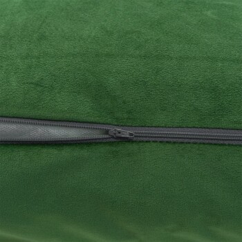 Nahaufnahme eines grünen Haustierbettes mit Reißverschluss, das seine weiche Textur und den strapazierfähigen Stoff zeigt.