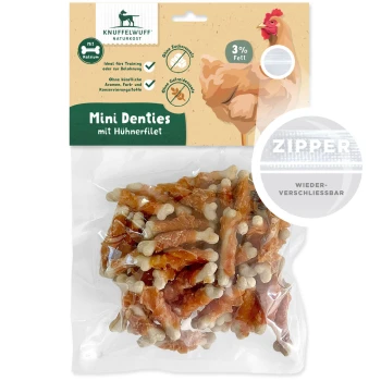 Packung Knuffelwuff Mini Denties mit Hähnchenfilet, mit kleinen knochenförmigen Leckerlis, 3% Fett und einem wiederverschließbaren Reißverschluss.