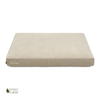 Beige Haustierbett mit einer weichen Oberfläche und einem hellbraunen Rand, mit dem Logo "Doctor Bark" und einem "Green Label" Emblem.