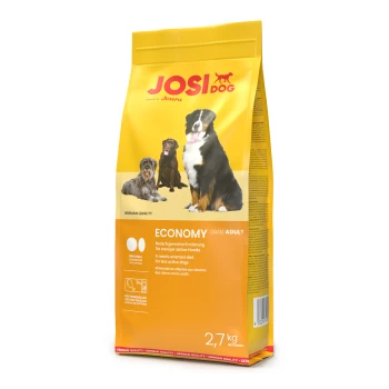 Gelbe Tüte JosiDog Economy Adult Hundefutter mit Bildern von drei Hunden und Text in Deutsch, Englisch und Französisch.