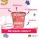Rosa Behälter mit der Aufschrift "ICE ICE Buddy" für DIY-Hunde-Eiscreme, mit Erdbeeren, Kokosnuss, Quinoa und Heidelbeeren. 100% natürlich.