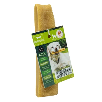 Hond kauwtraktatie met verpakking met een blije hond die een kauwstaaf vasthoudt, gelabeld 'DAUERKAUER,' '100% natuurlijk,' en 'M maat.'