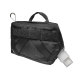 Schwarze Haustierzubehör-Tasche mit strukturiertem hexagonalem Muster, mit einem Griff, Klettverschluss und einer kleinen angehängten Flasche.