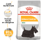 Sac de nourriture pour chiens Royal Canin Dermacomfort Mini avec une illustration de Terrier écossais, mettant en avant des allergènes réduits et 91% de satisfaction des propriétaires.