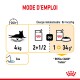 Instructions pour nourrir un chat de 4 kg : 2,5 boîtes ou 1 boîte plus 34 g de nourriture Royal Canin Indoor, avec une note pour fournir de l'eau.