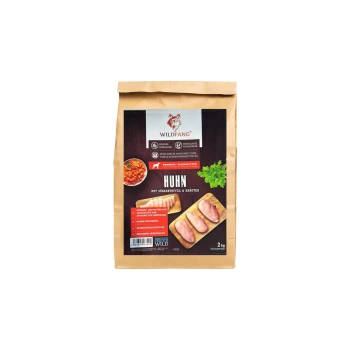 ® Adult Trockenfutter mit Huhn 6 kg Braune Papiertüte mit Hundefutter, beschriftet mit "WILDFANG Huhn mit Süßkartoffel & Kräuter", mit Bildern von Hühnerfilets und Gemüse.