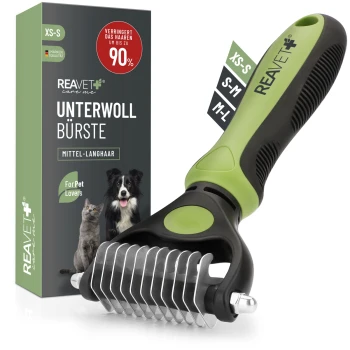 Zweiseitige Unterwollbürste mit ergonomischem Griff in Grün und Schwarz, in einer Box mit der Aufschrift 'REAVET Unterwoll Bürste', die behauptet, das Haaren um 90% zu reduzieren.