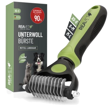Zweiseitige Unterwollbürste mit ergonomischem Griff in Grün und Schwarz, in einer Box mit der Aufschrift 'REAVET Unterwoll Bürste', die behauptet, das Haaren um 90% zu reduzieren.
